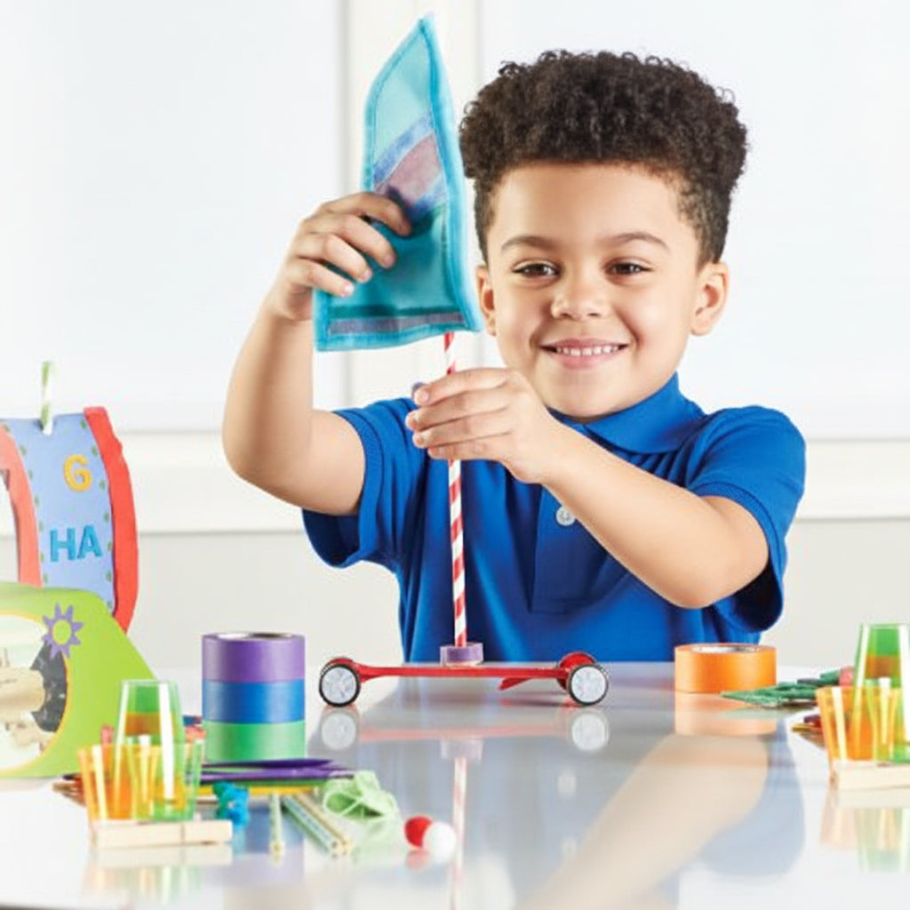 Child playing with educational toys at a table